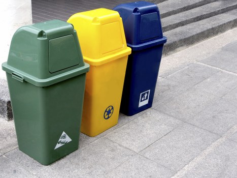 Modern waste removal trucks in Penge